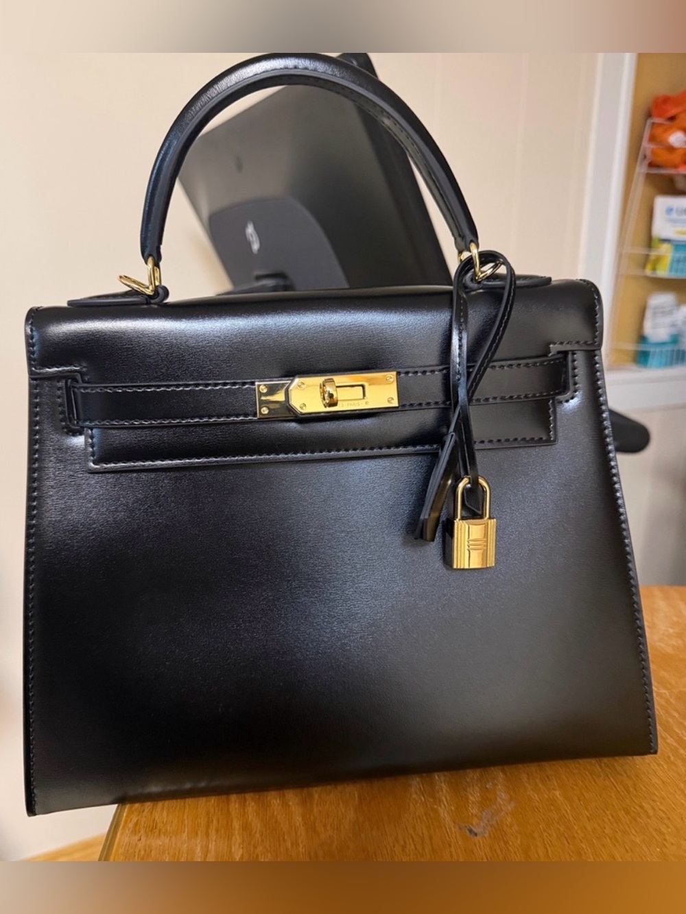 Black Leather Top-Handle Bag with Gold Hardware